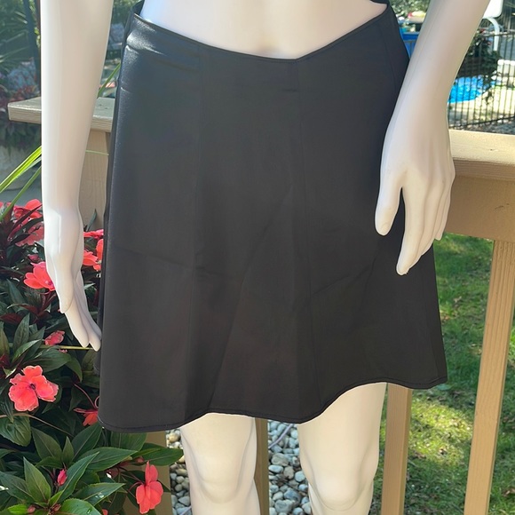 Abercrombie & Fitch Dresses & Skirts - 🛍5 for $20 🛍️ Skater skirt by Abercrombie & Fitch, black satin like material